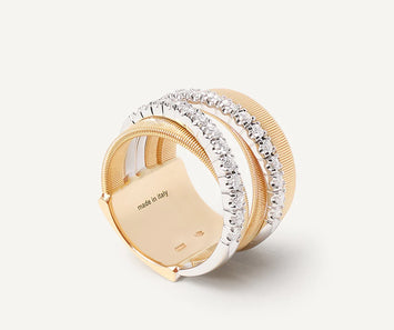 Marco Bicego - Bague 5 rangs entrelacés en or jaune 18 carats et diamants. Une bague moderne tout en volume. Chaque pièce est fabriquée entièrement à la main dans l'atelier de MARCO BICEGO situé au nord de l’Italie. Taille spécifique possible sur commande. existe en or blanc    Diamants : 0,78 carats Référence : AG331 B YW