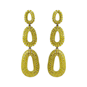 Boucles d'oreille strass jaune citrine : CSBO1070CI   Laiton Plaqué palladium certifié sans nickel.        Fermoir oreilles percées tiges titanium (hypoallergénique)   Hélène Zubeldia nous raconte une histoire à travers ses collections. Sobre en apparence mais sophistiquée, la pureté des formes et des lignes met en valeur la morphologie féminine qui reste le principal terrain d’expression d’une dualité omniprésente.