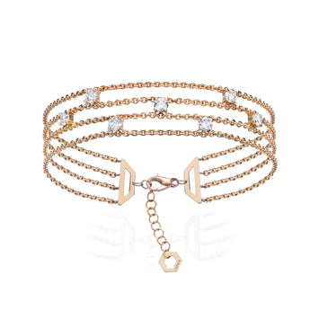 BURATO EDITOR64 Reference
CX303

Technical Data
18 KT Yellow Gold solitaire bracelet with three chains

Round cut White Diamonds
Carats: 0.70
Colour: F
Clarity: VS

Réglable 16 + 2 cm -

L’élégance de ce bracelet célèbre l’extraordinaire éclat des diamants, qui alternent sur quatre fils d’or jaune 18 carats, illuminant le poignet comme une nuit étoilée. Ce bijou attire tous les regards grâce à la splendeur de l’or et aux jeux de lumière des pierres précieuses.